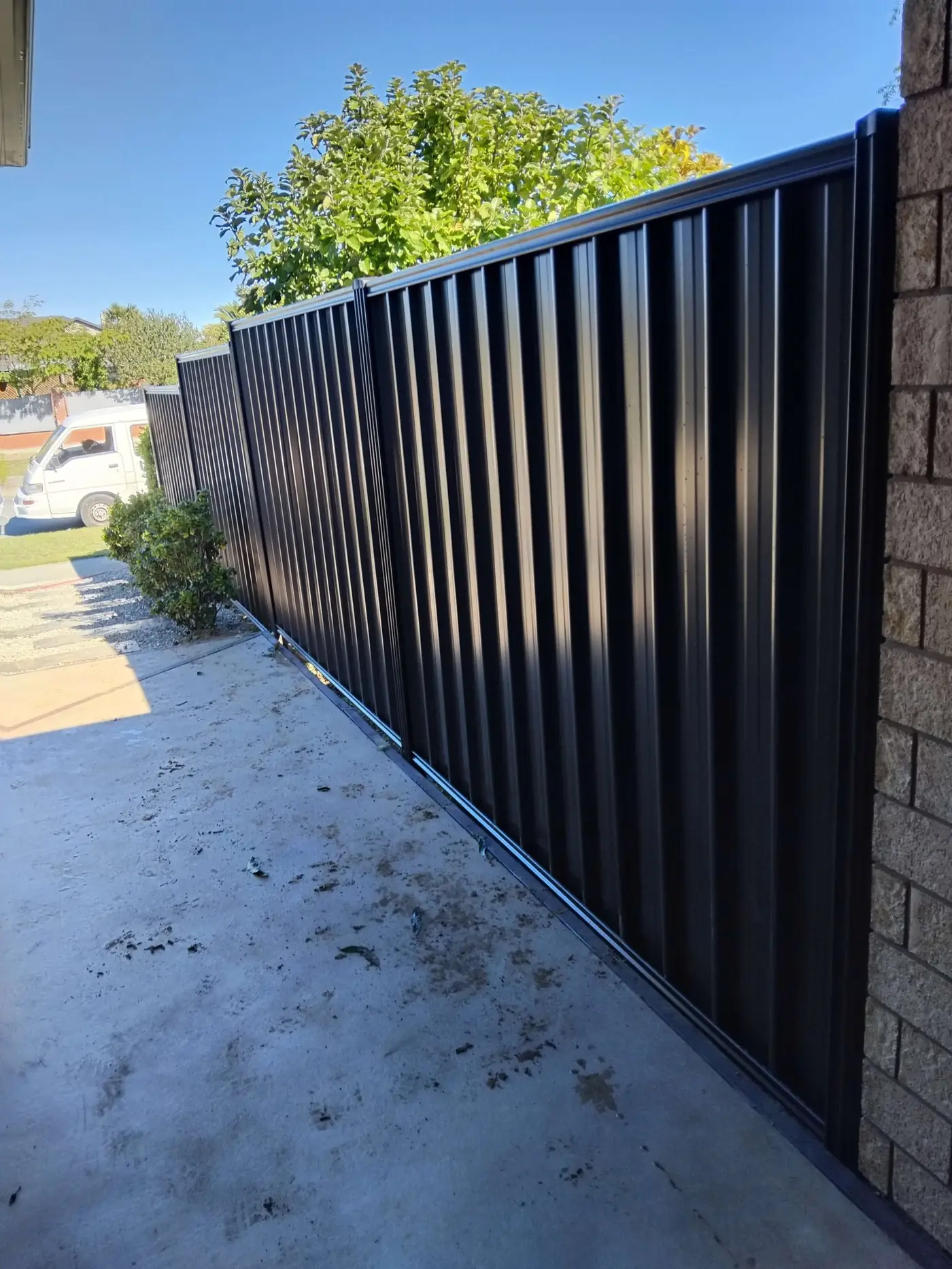 Aluminium slat panel fencing installed by Classic Timber Fences
