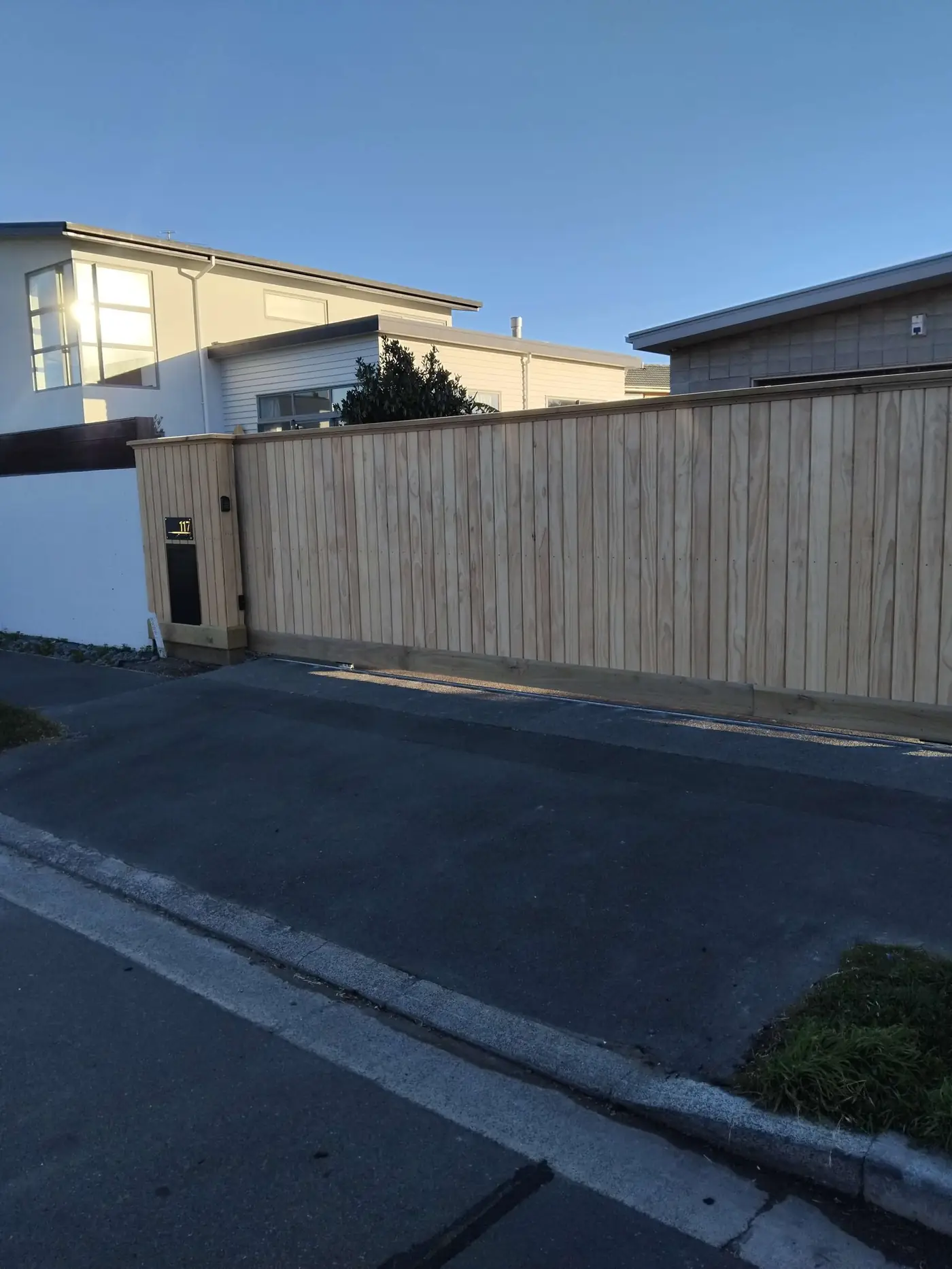 Custom timber driveway gate built by Classic Timber Fences