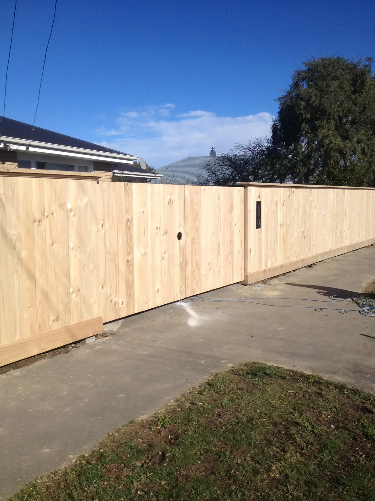 Dressed timber fence and matching driveway gate