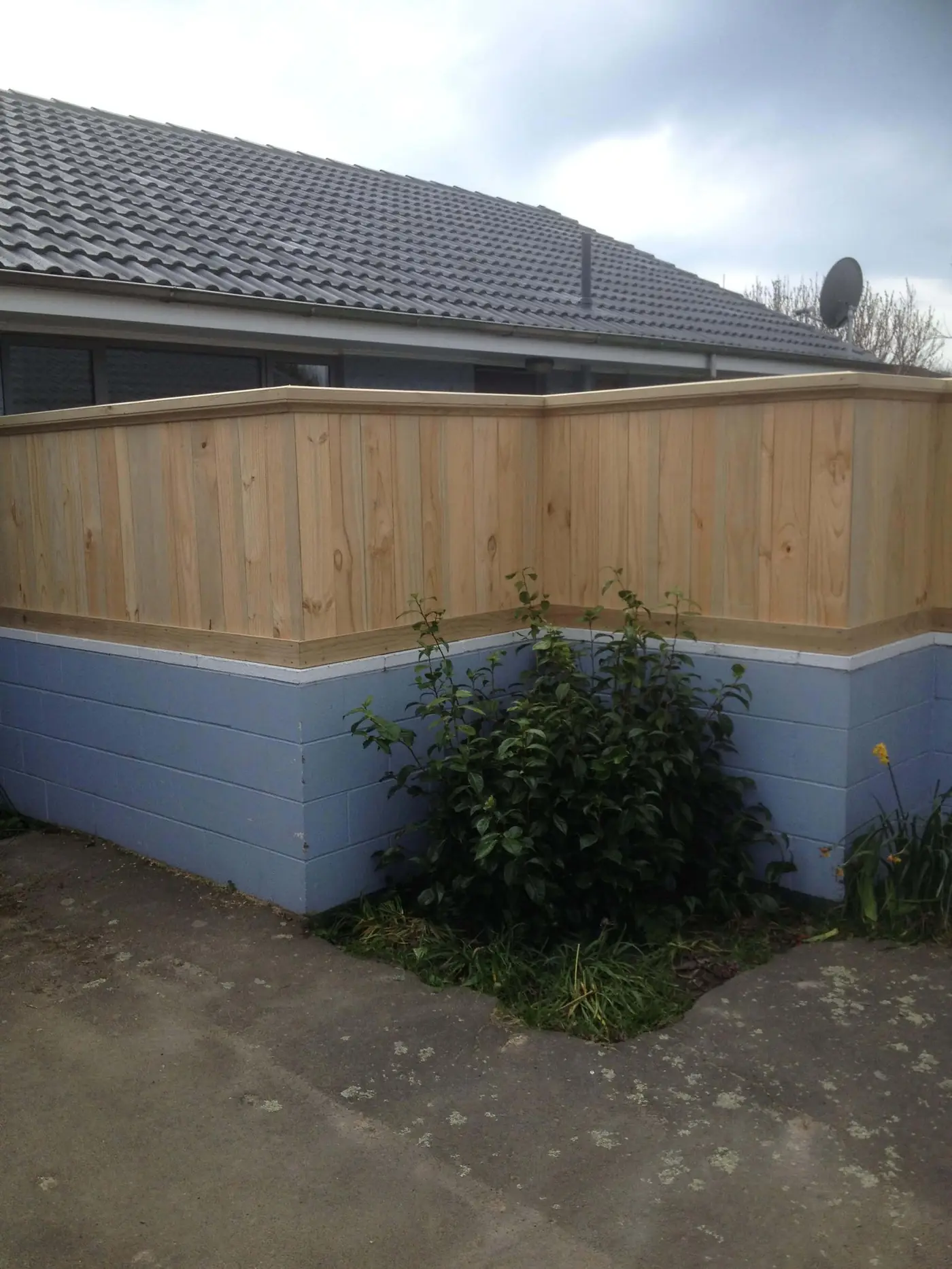 Privacy fence installed over an existing brick wall, Harewood, Christchurch