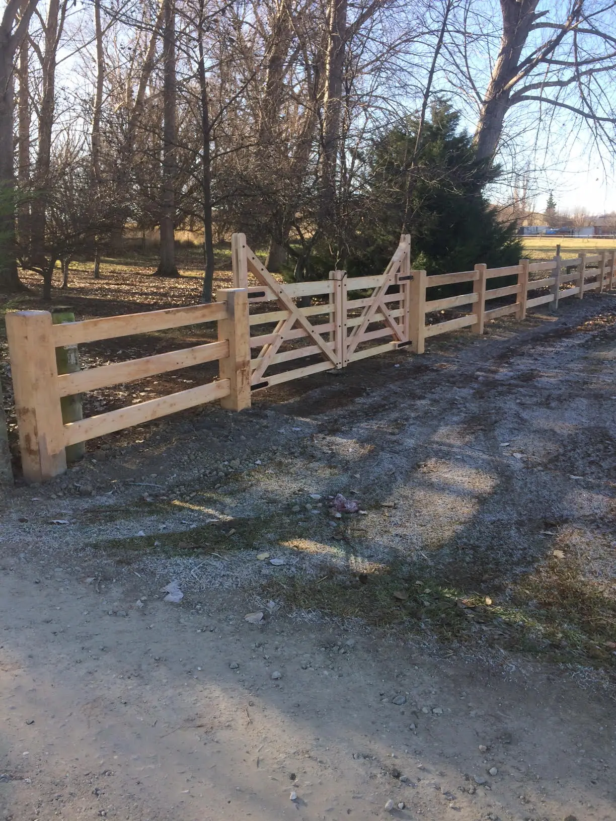 Post and rail fence with a timber farm gate, Central Otago